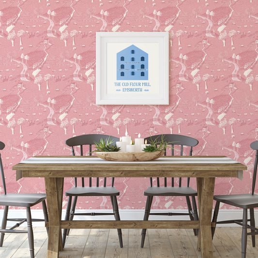 The Long View scenic landscape wallpaper in rose pink sits in dining room,