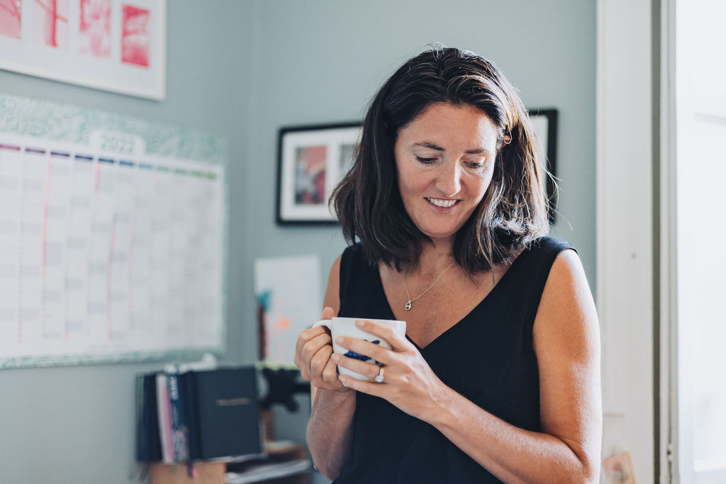 Brand photography captures Katie and her daily cup of tea.